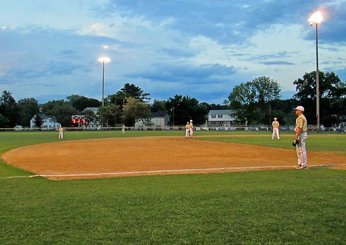 Baseball on a July evening by Barbara L. Slavin