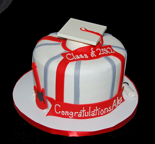 High School Graduation CAke with a graduation hat, diploma and electric guitar