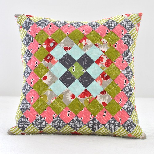 Trip Around the World pillow in Ruby