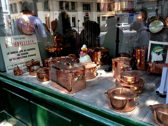 Copper cookware in the window at E. Dehillerin
