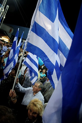Party faithful listen to speech by Conservative leader, Antonis Samaras at election rally - Thessaloniki, Greece
