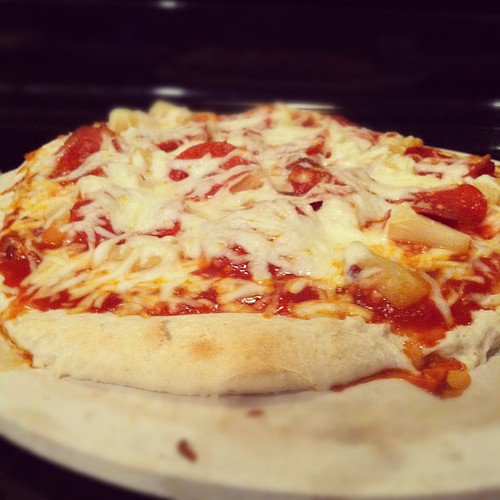 First ever homemade pizza. Quick and easy! I must do this again! (pepperoni, bacon, pineapple, and mozzarella cheese)