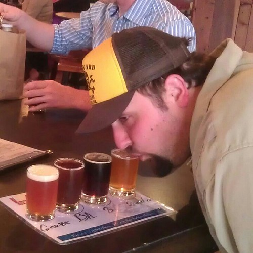 Theo "Broma" Skourtist getting down with a sampler tray at Lagunitas