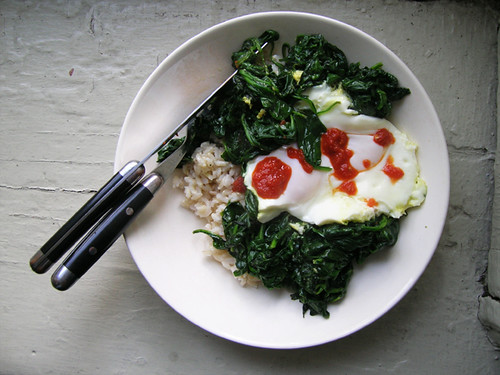 rice bowl with fried eggs and spinach