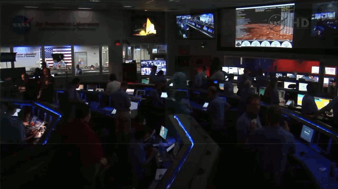 NASA Deep Space Operations, MSL Mission Operations Flight Control after Mars Science Laboratory lands "Curiosity" wheels on Mars and the Deep Space Network Operations Center, Pasadena, California, with text, animated, 2012.08.05 23:15