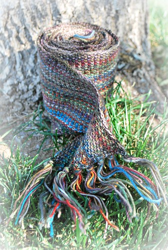 Linen stitch man scarf rolled up