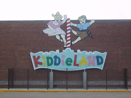 A preserved remnant of the Kiddieland Amusement Park sign on display at the Melrose Park Illinois Public Library building.  July 2012. by Eddie from Chicago