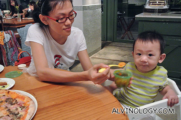Feeding Asher his puree with bread