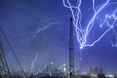 Multiple Strikes of lightning Hitting the CN Tower by Richard Gottardo