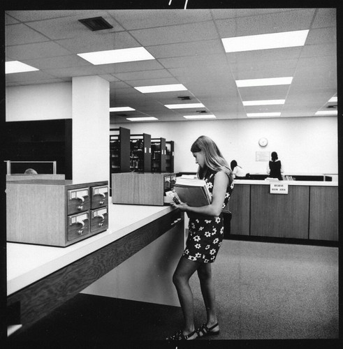 Vintage photo of student in Undergraduate Library