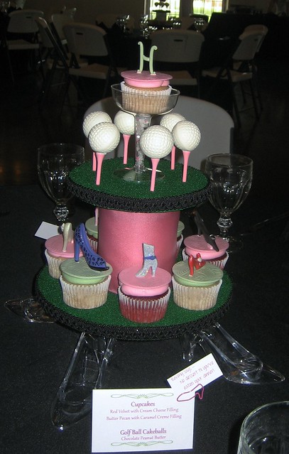 One of 15 centerpieces featuring 8 cupcakes and 6 cake balls