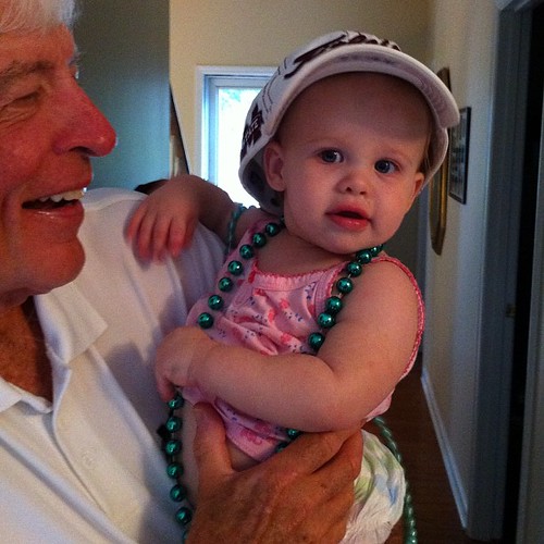 Wearing Mardi Gras beads & Pop-Pop's MS State hat. And no pants. As you do.
