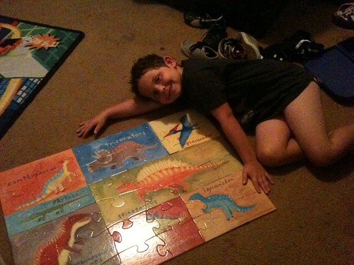 Zach completing a dinosaur puzzle 7-10-2012