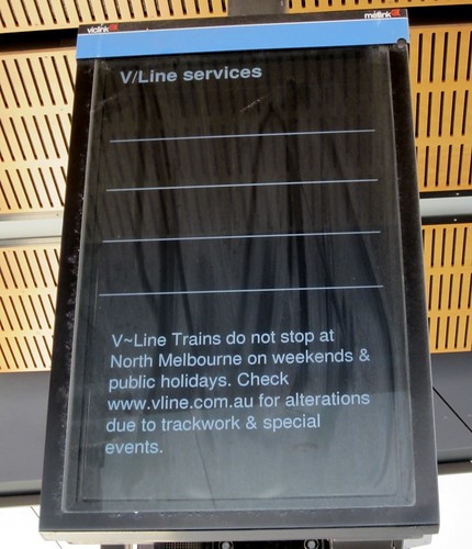 V/Line trains don't stop at interchange stations on weekends (sign at North Melbourne)