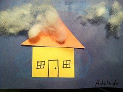 House with fluffy clouds