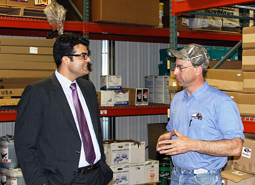 U.S. Department of Agriculture (USDA) Acting Business Administrator John Padalino  (left) visits with Ron Prins at Ron’s Repair in Worthington, Minn., on Thursday, May 31, 2012.  With USDA support, Prins moved his business from his home and now employs 22 workers.   USDA photo.