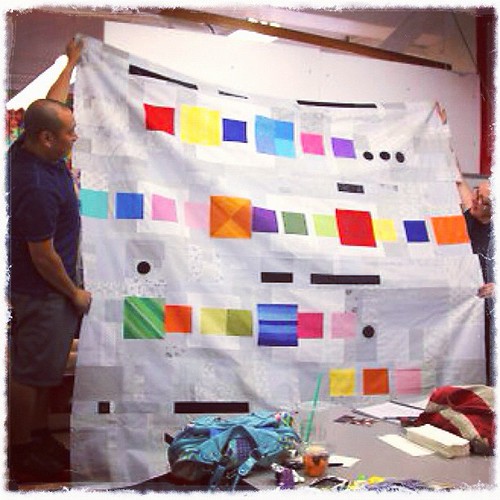 Showing my (almost completed) quilt top at the East Bay Modern Quilt Guild meeting...