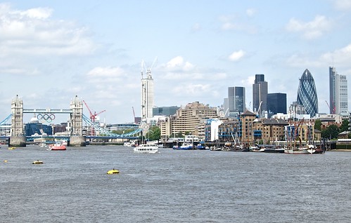 City skyline and the Olympic rings on Tower Bridge