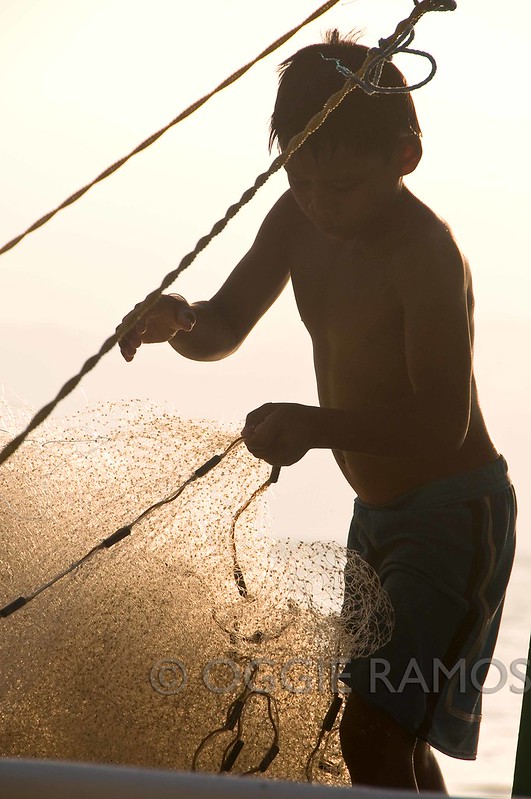 Cagbalete Quezon - Child Hauling Fishing Net at Sunset