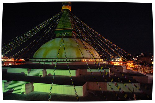 Jarung Kashor Stupa, the Wish Fullfilling Stupa, view at night with prayer flags, lotus petal wash pattern can be clearly seen, Boudha, Kathmandu, Nepal by Wonderlane