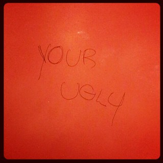 Bathroom stall graffiti. And "you are" very bad at grammar. :P