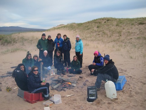 The group at Red Point in the dunes around the fire after a great day