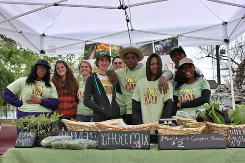 a Grow Dat crew at a farmers' market (courtesy of Grow Dat Youth Farm)