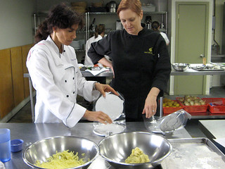 Rona and Chef Carol making Plantain Turnovers