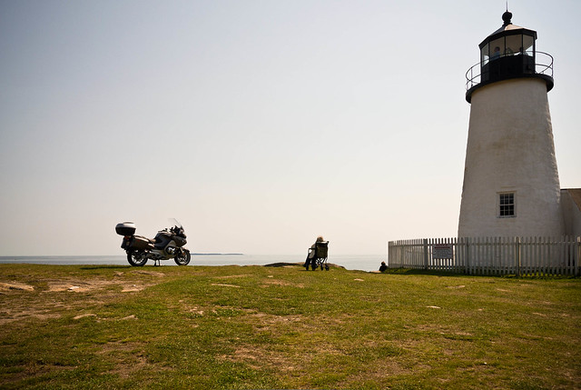 A motorcycle, a grandma, and a lighthouse