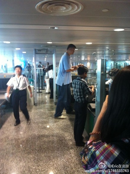September 28th, 2012 - Yao Ming goes through security at the Perth airport as he returns to China