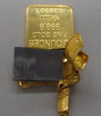 Tungsten-filled gold bar
