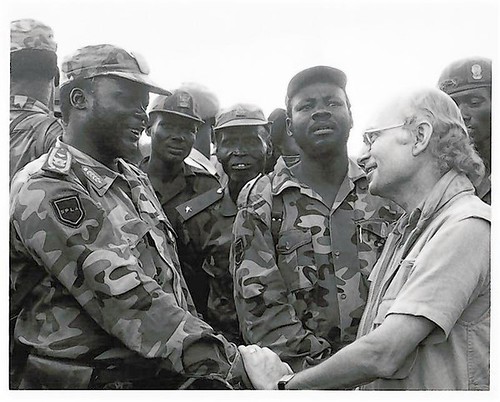 John Garang (L) shakes hands with Roger Winter, now an honorary adviser to the South Sudan government and one of the Council's original members, in this undated image taken in Sudan and provided to Reuters by Roger Winter. Nationhood has many midwives. by Pan-African News Wire File Photos