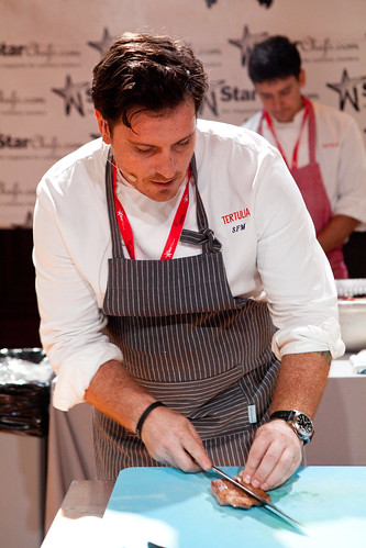 Chef Seamus Mullen slicing the  ibérico secreto
