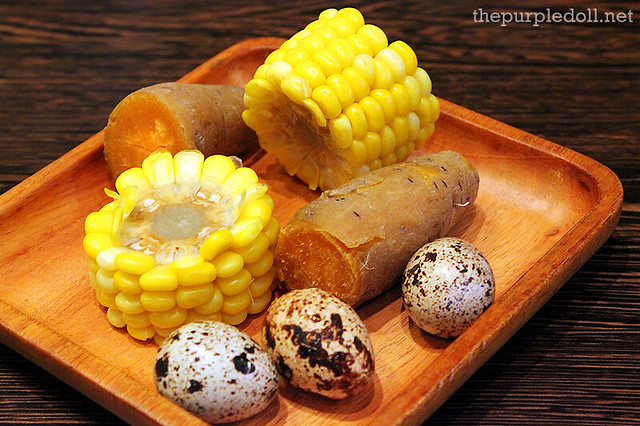Complimentary sweet potatoes, quail eggs, and sweet corn