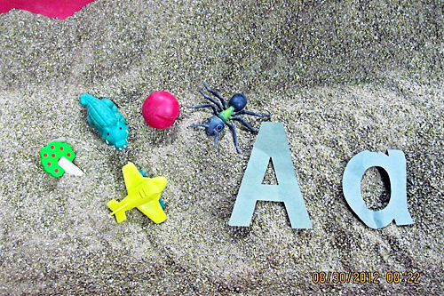A-items-in-sand