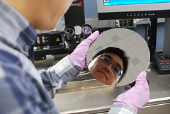 IBM researcher Hongsik Park looks over wafer with carbon nanotubes (IBM)