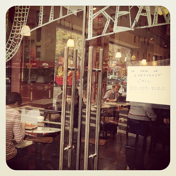 NYC coffee shop stays open during Sandy but posts an "emergency #" on the door!