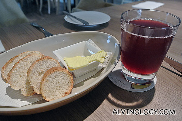 Fresh bread and cranberry juice