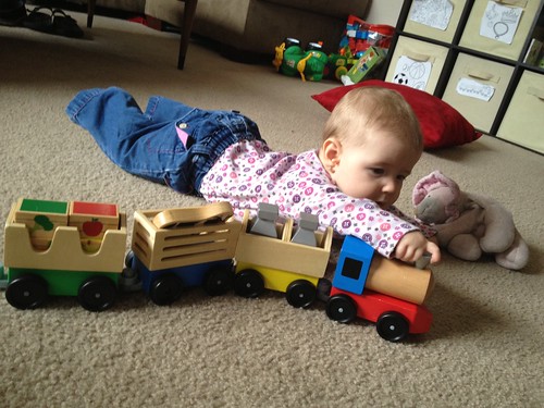 Dakota playing with a train.