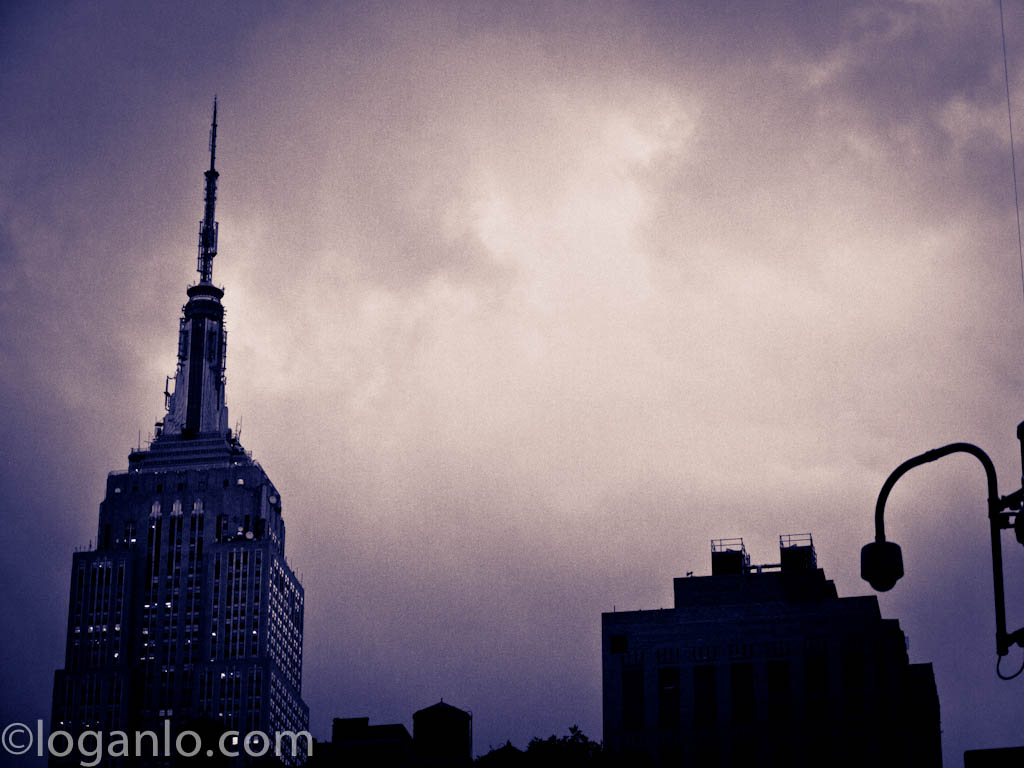 Empire State Building against a cloudy sky
