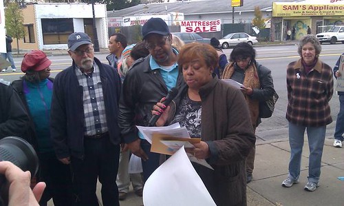 Rosedale Park homeowner Gail Cullors reads a statement against foreclosure outside the Bank of America branch on Grand River near Southfield in Detroit. Over 100 people marched on the bank on November 10, 2012. (Photo: Abayomi Azikiwe) by Pan-African News Wire File Photos