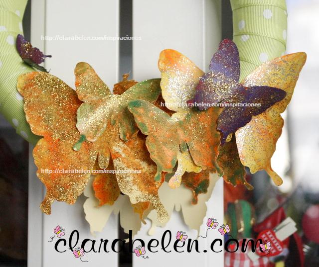 Como hacer una corona de mariposas de cartulina y lazos para Navidad