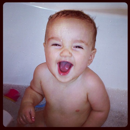 excited about his 1st bubble bath!! 
