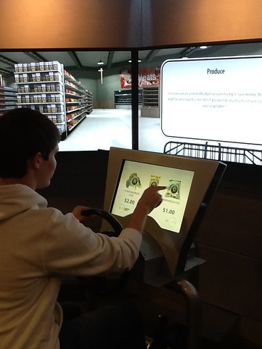 A high school student interacts with the new Food For Thought exhibit at the Koshland Science Museum in Washington, D.C.  Photo by: Dr. Robert Post