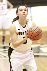 Kelsey Minato, West Point number 5, shooting a foul shot.