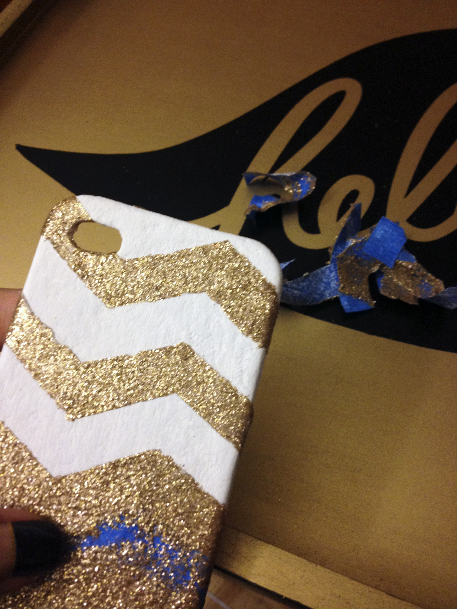 phone case makeover - peel off tape to reveal chevron pattern in glitter