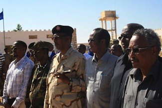Puntland President Farole meets with the Armo Police Academy officials in late November 2012. Puntland is a breakaway region in the north of Somalia. by Pan-African News Wire File Photos