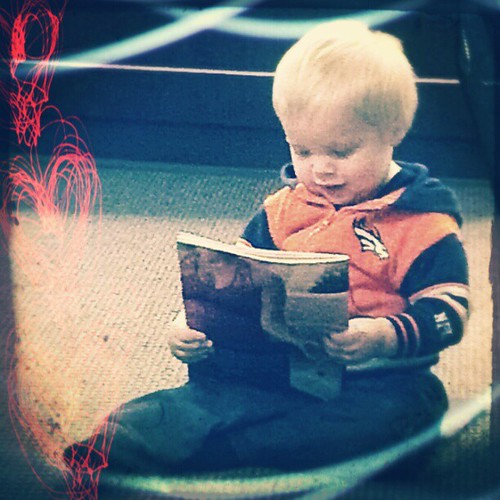 He grabbed a magazine and "read" it!
