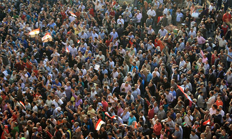 Egyptians demonstrate in Cairo over the new powers assumed by President Morsi. Many are already refering to him as a dictator. by Pan-African News Wire File Photos