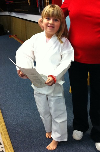 Catie's first karate lesson. The uniform is killing me, she's so cute.